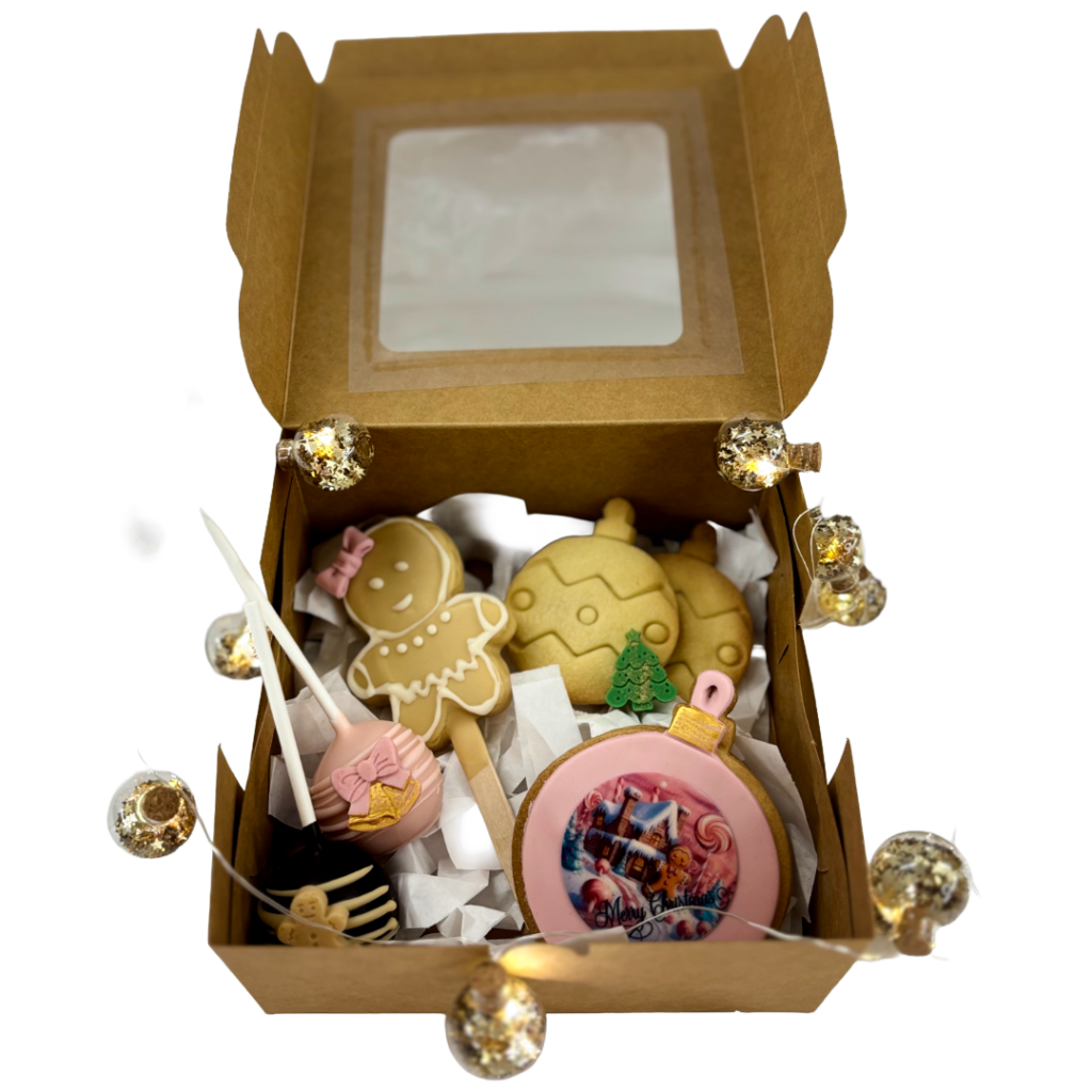 Geöffnete Box mit Advents-Sweets: Kekse, Cake Pops und Donut